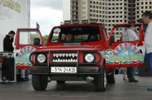 На стенде специальной аппаратурой меряют уровень мощности акустики автомобиля.  (Киев и область)